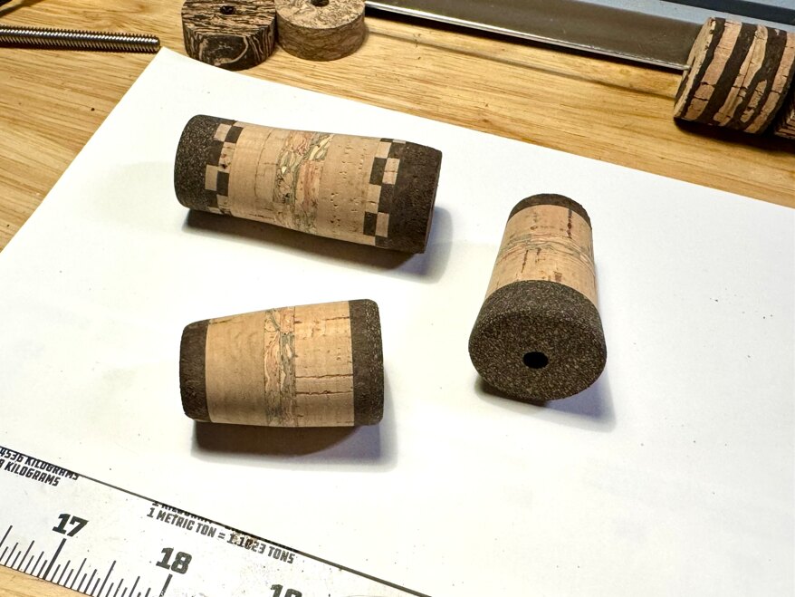 A coordinated set of custom cork grip pieces for a fishing rod